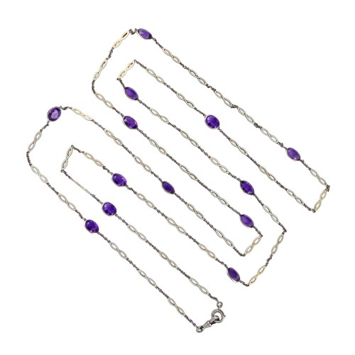 Early 20th century amethyst collet and enamel long chain necklace, c.1910,